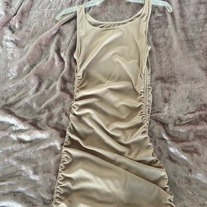 Beige cinched sides bodycon dress size small